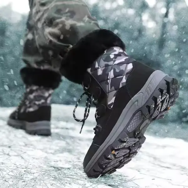 A person wearing camouflage pants and Wholesale Black Mixed Anti slip Women Snow Boots with TPR PU canvas, plush lining, and laced cotton shoes is walking on snowy ground.