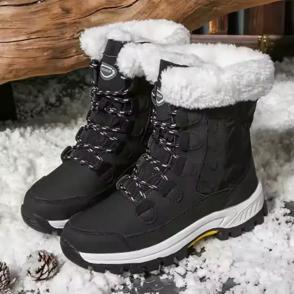 A pair of Customized Anti slip Solid Color Winter Laced Snow Boots for women, featuring thick cotton lining and rubber soles, is placed on snow by a wooden log.