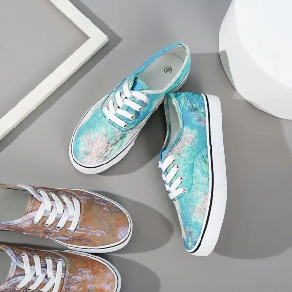 Two pairs of Wholesale China Factory Round Toe Unisex Tie Dye Canvas Shoes for women—one blue/green, the other brown/green—are displayed on a gray and white background.