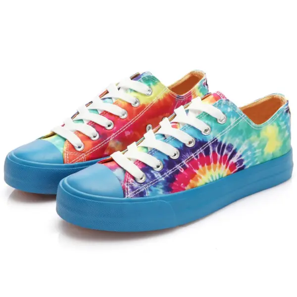 Wholesale sport classic canvas shoes with a blue and yellow tie-dye design, blue rubber soles and toe caps, perfect for school. OEM/ODM customization available.
