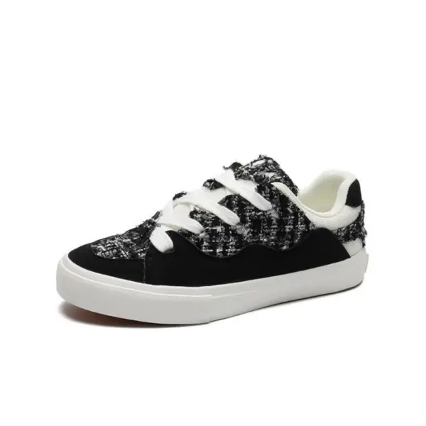 The 2025 Wholesale ODM Custom Summer New Canvas Sneakers feature a black and white tweed pattern, lace-up design, and white rubber sole, shown on a plain background to highlight their OEM/ODM versatility for both women and men.