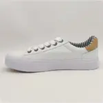 The New Arrivals Wholesale Band Vulcanized Fashion Leather Casual Canvas Shoes for Men feature a white low-top design, thick sole, metallic eyelets, striped inner lining, and tan heel accent—ideal for OEM ODM customization.