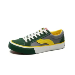 The OEM ODM Factory Wholesale Customized PU Rubber Canvas Shoes features green suede, gray canvas panels, yellow accents, and white laces on a white and yellow rubber sole. Perfect for sports or walking, and ideal for custom orders (OEM/ODM). Displayed on a white background.