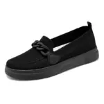 Spring Shoes for Women: Black slip-on loafer featuring a textured knit upper, decorative front chain, and flat rubber sole—available for OEM and ODM customization.