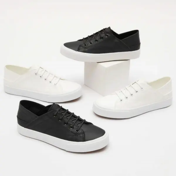 Four pairs of the Fashion Low Top PU Upper Casual Shoes—two black, two white—are displayed around a white rectangular block on a plain white background.