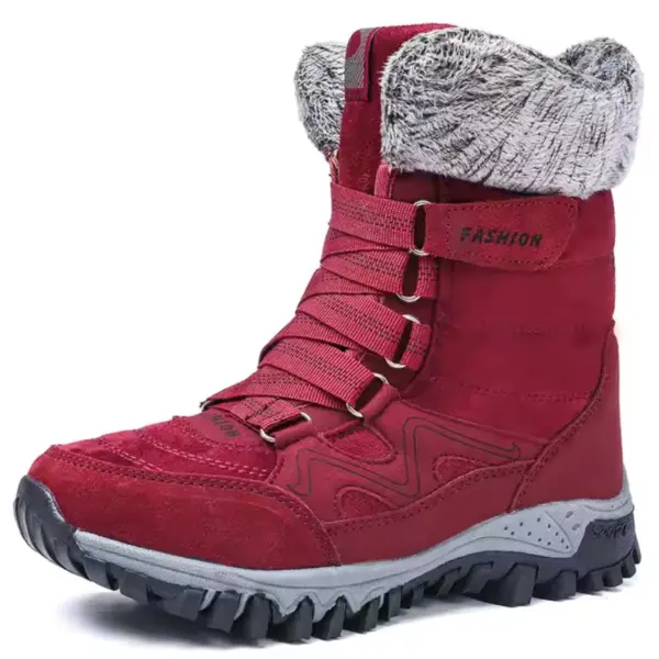 A red leather women's snow boot with gray faux fur lining, thick treaded sole, "FASHION" side label; available for wholesale OEM/ODM customization as breathable, warm lace-up cotton shoes.