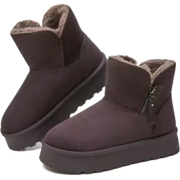 A pair of women's dark brown ankle boots with side zippers, thick soles, and soft fleece-like lining. New design for winter 2025, offering comfort and warmth. Available for OEM/ODM customization.