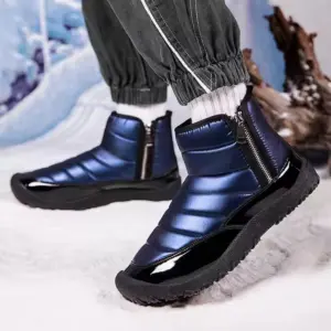 A person in gray pants and white socks stands on snow, wearing New Down Fabric Waterproof Men's Double Zipper Warm Outdoor Short Boots—thickened plucked winter cotton shoes with black soles.