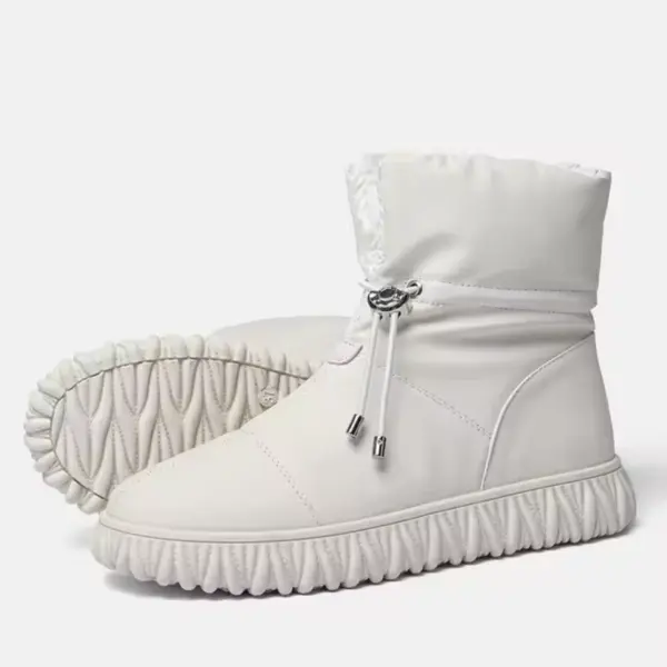 Plush thick genuine leather waterproof bread cotton fur winter snow boots for women, featuring textured soles and adjustable ankle drawstring, available for wholesale OEM ODM customization. Displayed on a white background.