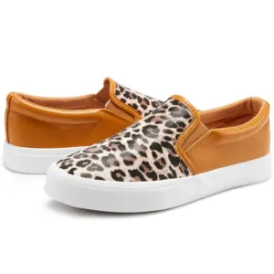 A pair of Fashionable Casual Waterproof PU Upper Slip-on Flats Shoes for women featuring tan leather sides and heel, leopard print fabric upper, elastic band, and white rubber soles.