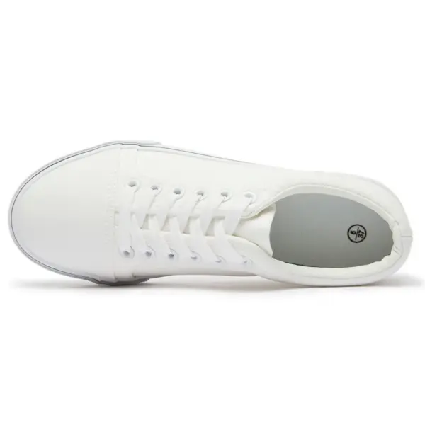 The XRH Wholesale Custom Logo Canvas Sneaker is a classic men's casual shoe, shown from above to highlight laces, eyelets, and insole—perfect for OEM/ODM customization and new style trends.