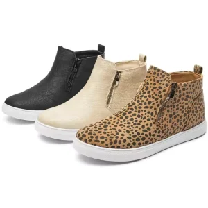 The 2025 new ankle boots for women are shown in black, beige, and tan with black spots—each slip-on with a side zipper, white rubber sole, and available for OEM/ODM customization.