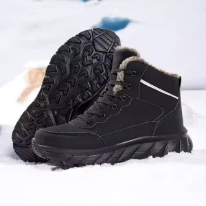 A pair of High Quality 2024 Men Custom Lace up Ankle Snow Boots are displayed on snow, one upright and one tilted to show the rugged sole and fur lining, highlighting premium OEM ODM craftsmanship.