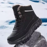 The High Quality 2024 Men Custom Lace up Ankle Snow Boots, featuring faux fur lining and thick tread sole for winter, is shown on a rock with snow in the background, available for OEM ODM customization.