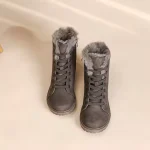 A pair of Snow Casual Ankle Boots for Men Leather Women Boots 2025 New Style Snow Winter in dark gray with faux fur lining, lace-up design, placed side by side on a light surface.