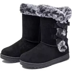 Fashion Walking Style Boots for Women—black winter boots with faux fur trim and side ribbon bows, ideal for OEM or ODM customization. Shown on a white background. Warm outdoor snow boots at low prices, perfect for ladies.