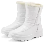 Wholesales Warm Snow OEM Custom Ankle Leather Furry Boots for Women feature white color, side zippers, quilted texture, rugged soles, and faux fur lining—customizable (OEM/ODM) to match your brand’s needs.