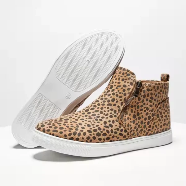 A pair of 2025 New Black Beige Snake Leopard Ankle Boots for women—one boot upright and the other on its side, featuring winter leather and ladies’ design.