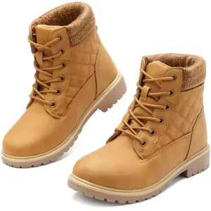 A pair of 2025 Winter Snow Ankle Boots for Men and Women, featuring high heels and platform soles—perfect for wholesale, OEM, or ODM customization.